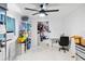 Bright, versatile office space with an attached storage room and ample shelving for organization at 211 Indiana Ave, St Cloud, FL 34769