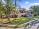 Attractive single-story home with a large yard and driveway at 223 Royal Oaks Cir, Longwood, FL 32779