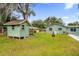 Spacious backyard with a shed and fire pit at 223 Royal Oaks Cir, Longwood, FL 32779