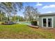 Large backyard with pool, deck, and shed at 223 Royal Oaks Cir, Longwood, FL 32779