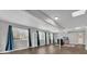 Spacious basement recreation room with new flooring and plenty of natural light at 223 Royal Oaks Cir, Longwood, FL 32779