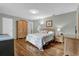 Charming bedroom with wood floors and plenty of natural light at 223 Royal Oaks Cir, Longwood, FL 32779