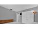 Spacious bedroom with double doors and wood floors at 223 Royal Oaks Cir, Longwood, FL 32779