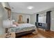 Cozy bedroom with a comfortable bed and ample closet space at 223 Royal Oaks Cir, Longwood, FL 32779