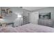 Bedroom with wood floors and modern dresser at 223 Royal Oaks Cir, Longwood, FL 32779