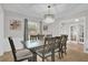 Spacious dining room featuring a large table and access to the back yard at 223 Royal Oaks Cir, Longwood, FL 32779