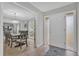 Bright and airy entryway with tile flooring and a view into the dining area at 223 Royal Oaks Cir, Longwood, FL 32779