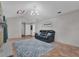 Spacious living room with a fireplace and lots of natural light at 223 Royal Oaks Cir, Longwood, FL 32779