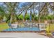 Relaxing patio area with seating for outdoor dining and entertaining at 223 Royal Oaks Cir, Longwood, FL 32779