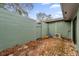 Private brick patio with a wall and AC unit at 223 Royal Oaks Cir, Longwood, FL 32779