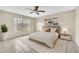 Main bedroom with tiled floors and large window at 2321 Prime Cir # B, Kissimmee, FL 34746