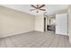Bedroom with ensuite bathroom and tile floors at 2321 Prime Cir # B, Kissimmee, FL 34746