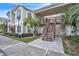 Front view of condo with stairs and walkway at 2321 Prime Cir # B, Kissimmee, FL 34746