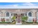 Two-story condo building with stairs and balconies at 2321 Prime Cir # B, Kissimmee, FL 34746