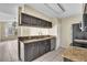 Open kitchen with granite counters and stainless steel appliances at 2321 Prime Cir # B, Kissimmee, FL 34746