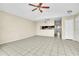 View of open living space with kitchen and hallway at 2321 Prime Cir # B, Kissimmee, FL 34746