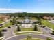 Aerial view of community center with pool and parking at 2641 Tranquility Way, Kissimmee, FL 34746