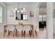 Open concept dining room with view into the kitchen at 2641 Tranquility Way, Kissimmee, FL 34746