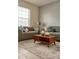 Cozy living room with a modern coffee table and accent pillows at 2641 Tranquility Way, Kissimmee, FL 34746