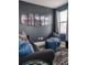 Home theater room with bean bag chairs and movie art at 2641 Tranquility Way, Kissimmee, FL 34746
