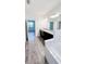 Bathroom with double vanity and a garden tub at 273 Ancona Ave, Debary, FL 32713