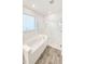 Spa-like bathroom with soaking tub and walk-in shower at 273 Ancona Ave, Debary, FL 32713