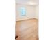Bright bedroom with light wood flooring and large window at 273 Ancona Ave, Debary, FL 32713