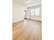Spacious bedroom with wood-look floors and a window at 273 Ancona Ave, Debary, FL 32713