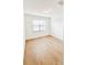 Spacious bedroom with wood-look flooring and a window at 273 Ancona Ave, Debary, FL 32713