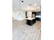 Open concept kitchen with island and breakfast bar; features a wine cooler at 273 Ancona Ave, Debary, FL 32713