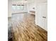 Spacious living room with wood-look tile flooring at 273 Ancona Ave, Debary, FL 32713