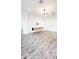 Bright living room featuring wood-look tile floors at 273 Ancona Ave, Debary, FL 32713