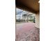 Screened patio with paver stones and string lights at 273 Ancona Ave, Debary, FL 32713