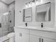 Modern bathroom with double vanity and walk-in shower at 2831 Sw 166Th Ln, Ocala, FL 34473