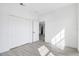 Bedroom with double door closet and wood-look floors at 2831 Sw 166Th Ln, Ocala, FL 34473