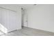 Bedroom with double door closet and wood-look floors at 2831 Sw 166Th Ln, Ocala, FL 34473