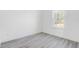 Spacious bedroom with large window and neutral decor at 2831 Sw 166Th Ln, Ocala, FL 34473