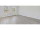 Bright bedroom with large windows and neutral walls at 2831 Sw 166Th Ln, Ocala, FL 34473