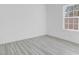 Well-lit bedroom featuring a large window and light walls at 2831 Sw 166Th Ln, Ocala, FL 34473