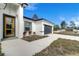 Front entrance with yellow door and gray accents at 2831 Sw 166Th Ln, Ocala, FL 34473