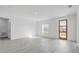 Bright and airy living room with wood-look floors at 2831 Sw 166Th Ln, Ocala, FL 34473