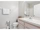 Clean bathroom with a single sink vanity and shower at 305 Therese St, Davenport, FL 33897