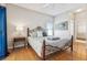 Guest bedroom with a full-size bed and ensuite bathroom at 305 Therese St, Davenport, FL 33897