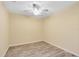 Bright bedroom with hardwood floors and ceiling fan at 392 Carina Cir, Sanford, FL 32773