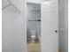 Bathroom features a tub, toilet and blue tile accents at 4172 Versailles Dr # 4172D, Orlando, FL 32808