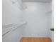 Walk-in closet with wire shelving and wood floor at 4172 Versailles Dr # 4172D, Orlando, FL 32808