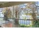 Enjoy tranquil lake views from this screened balcony at 4172 Versailles Dr # 4172D, Orlando, FL 32808