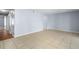 Spacious living room with tile flooring and light walls at 4172 Versailles Dr # 4172D, Orlando, FL 32808