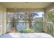 Screened balcony overlooking a lake view at 4172 Versailles Dr # 4172D, Orlando, FL 32808