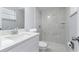 Clean bathroom with marble shower and white vanity at 4403 Brooke St, Orlando, FL 32811
